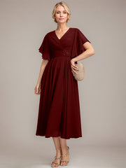 A-line V-Neck Tea-Length Chiffon Mother of the Bride Dress With Pleated Beading